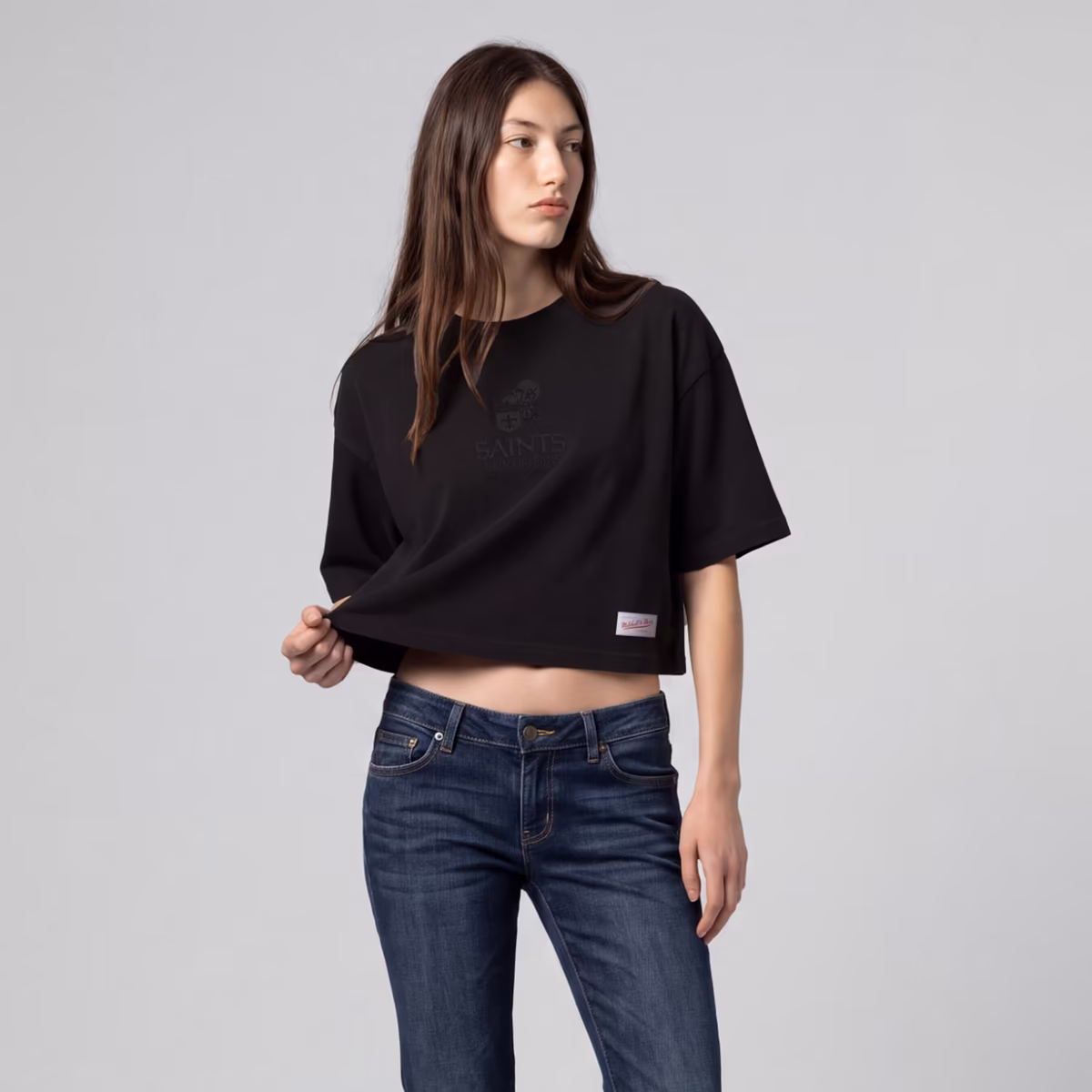 Women's Mitchell & Ness Black New Orleans Saints Core Essentials Micro Logo Boxy Crop T-Shirt 2 Women's Mitchell & Ness Black New Orleans Saints Core Essentials Micro Logo Boxy Crop T-Shirt