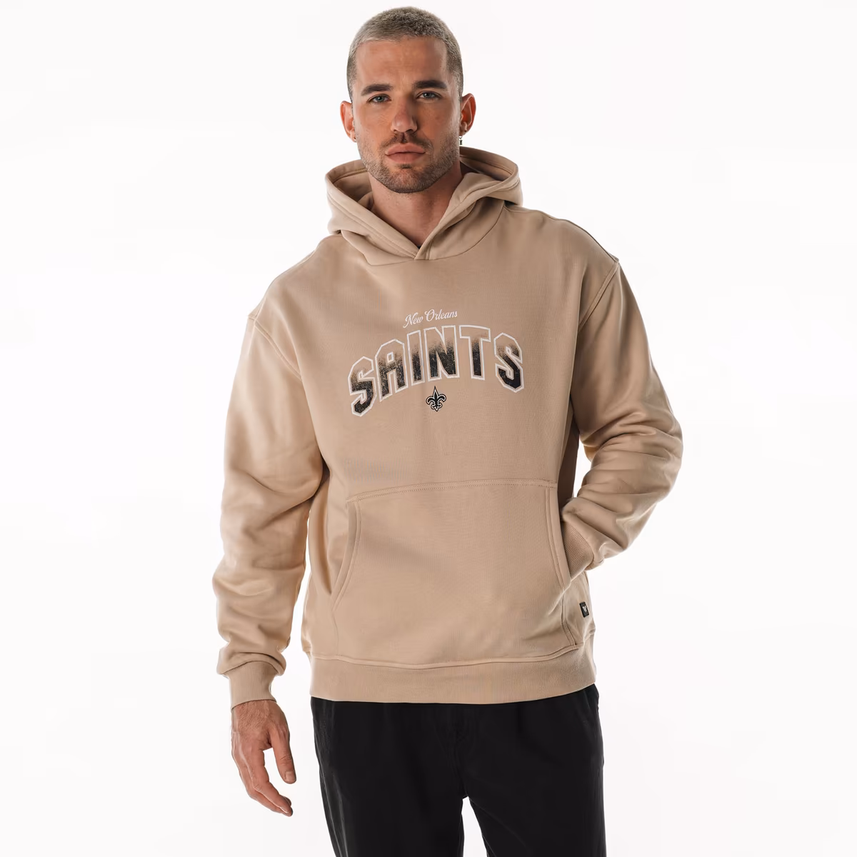 Unisex The Wild Collective Tan New Orleans Saints Oversized Graphic Fleece Hoodie 1 Unisex The Wild Collective Tan New Orleans Saints Oversized Graphic Fleece Hoodie